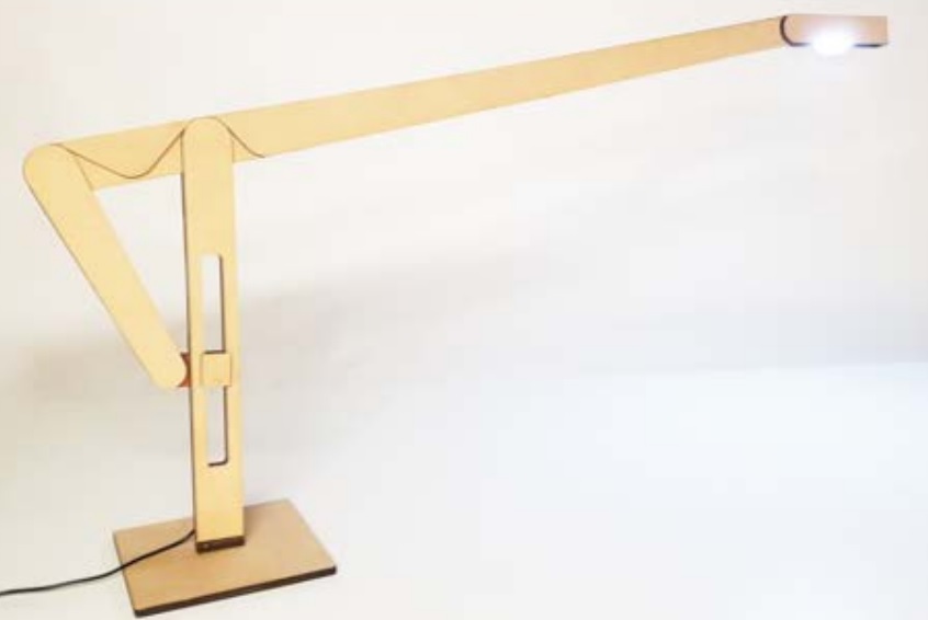 LamiFold embeds mechanisms by cutting and laminating stacked sheets, resulting in zero-effort assembly. Reproducibility is fragile because performance depends on tightly coupled machine and material parameters.